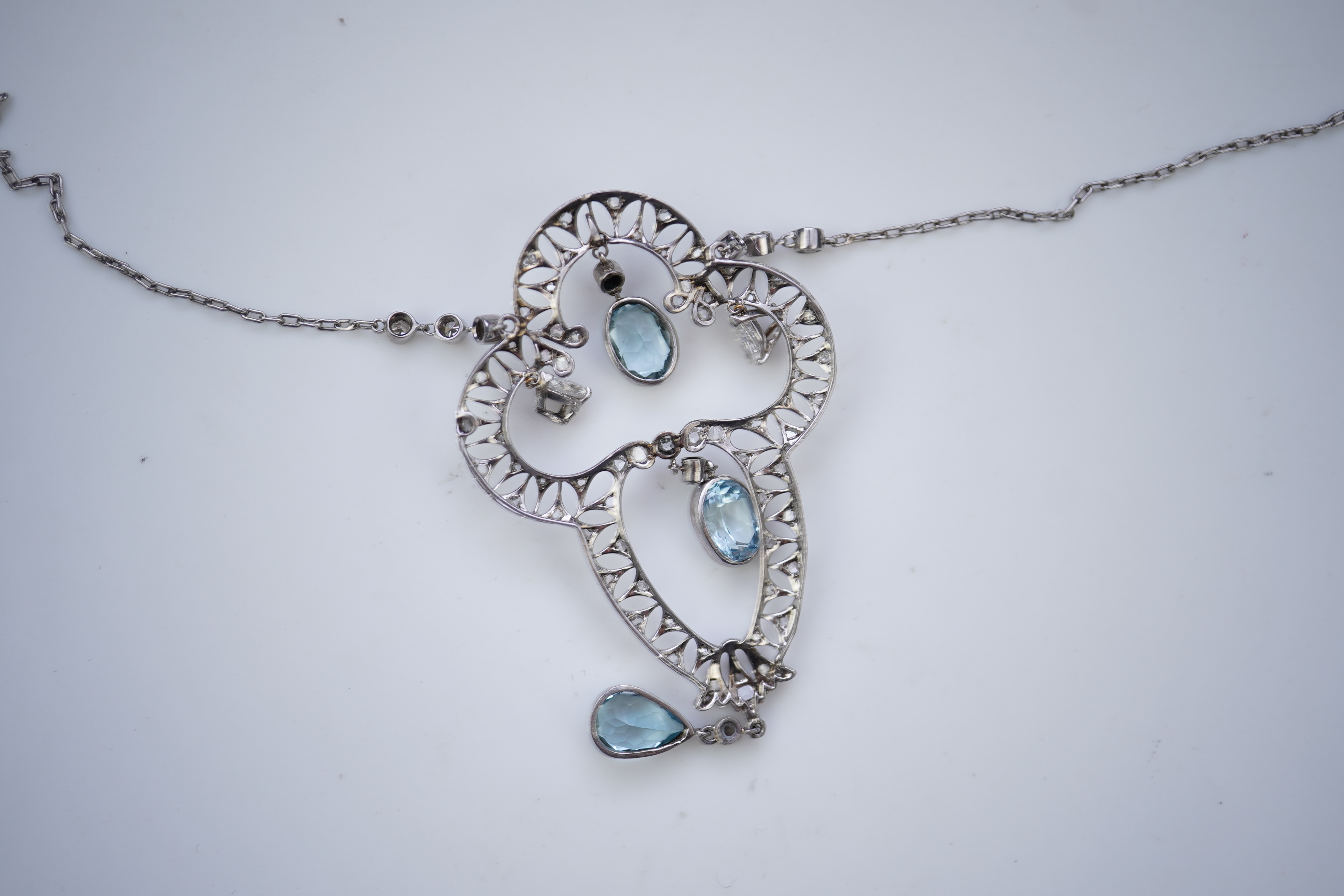 An Edwardian aquamarine and diamond pendant, circa 1910